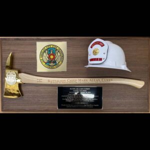 plaque with fire axe and helmet
