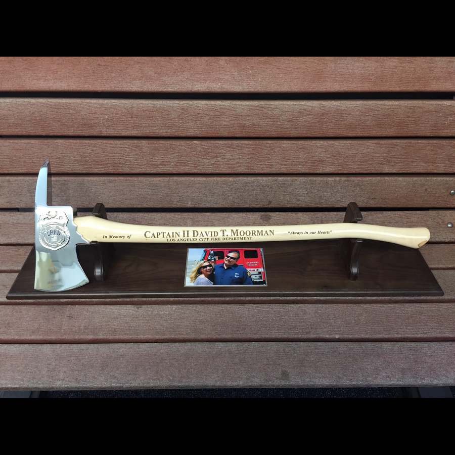 Trophy axe on pedestal with photo